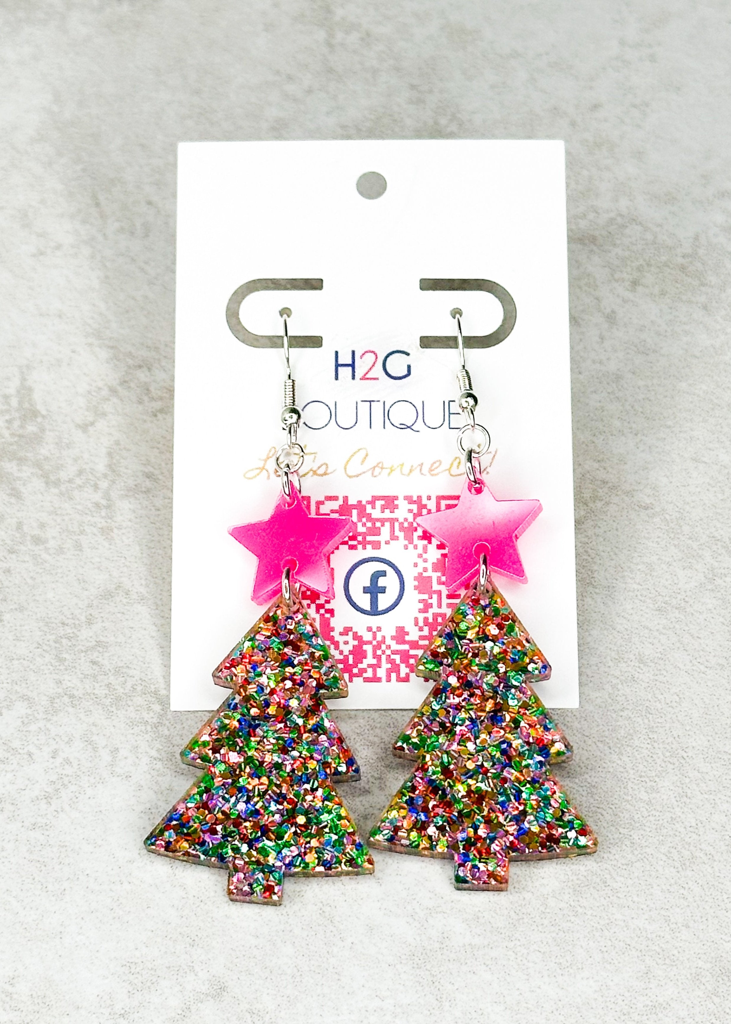 Multicolor glitter Christmas tree post back earrings with pink star.