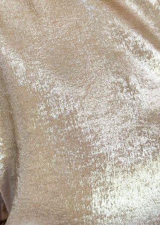 close up of shimmer champagne V-neck blouse 