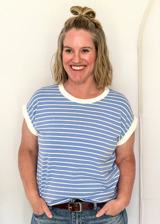 wide striped top with cuffed sleeves, and white banded rounded neckline.