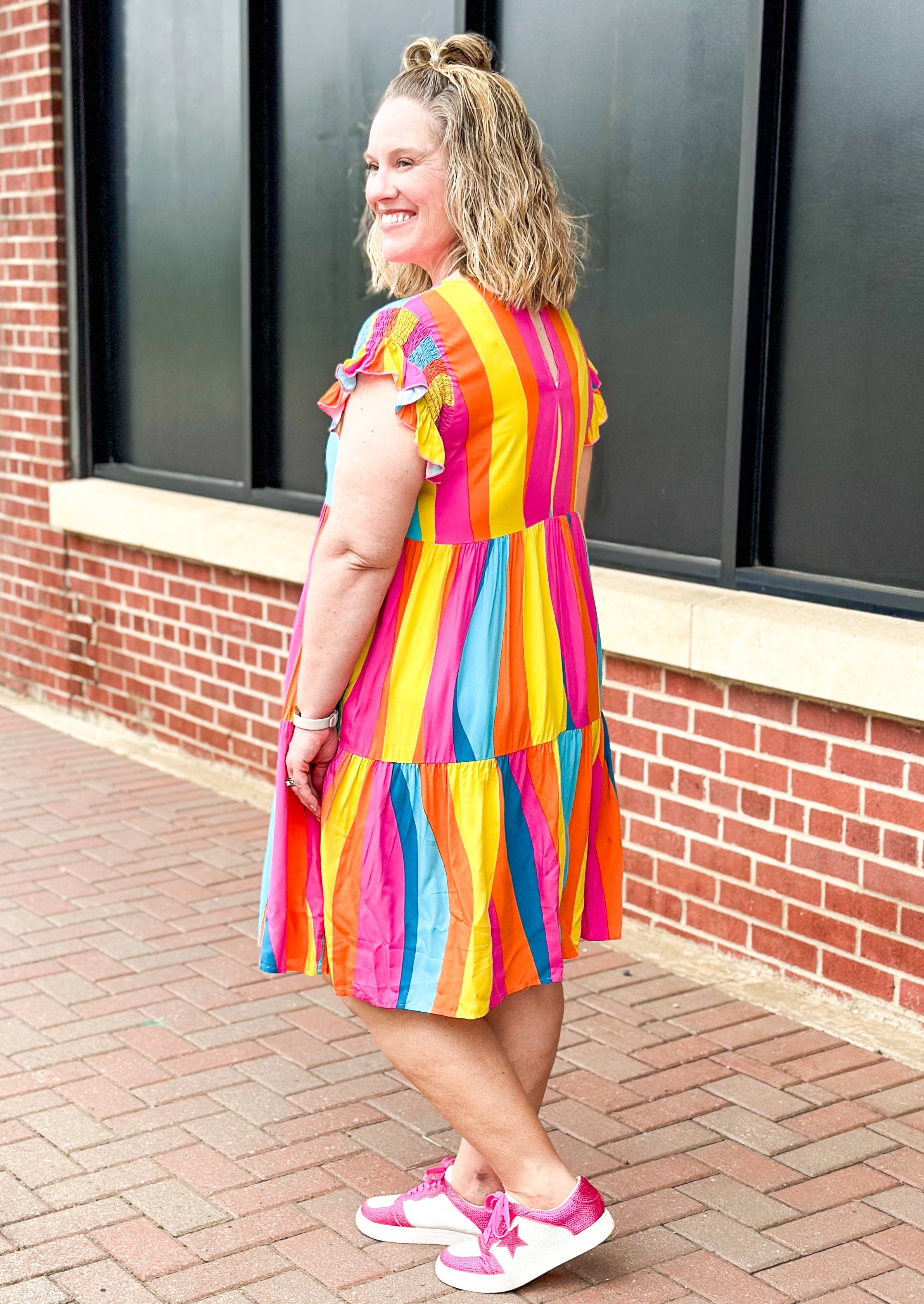 Vertical stripe tiered dress with smocked ruffle short sleeve - pockets - stripes are yellow, pink, orange and 2 shades of blue