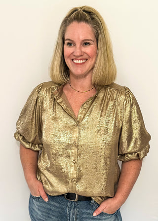 Shimmer gold lightweight button up blouse with collared neckline and ruched sleeves.