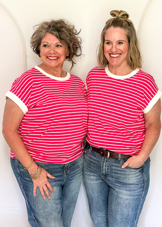 wide striped top with cuffed sleeves, and white banded rounded neckline.