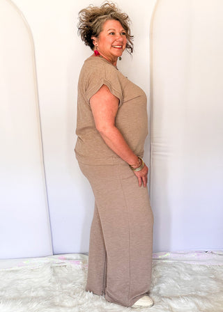 light brown two-piece lounge set with relaxed short sleeve top and wide-leg pants
