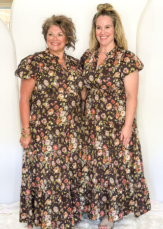 Brown with fall florals, short sleeve tiered maxi dress.  V-neck and puff sleeve and lined. 