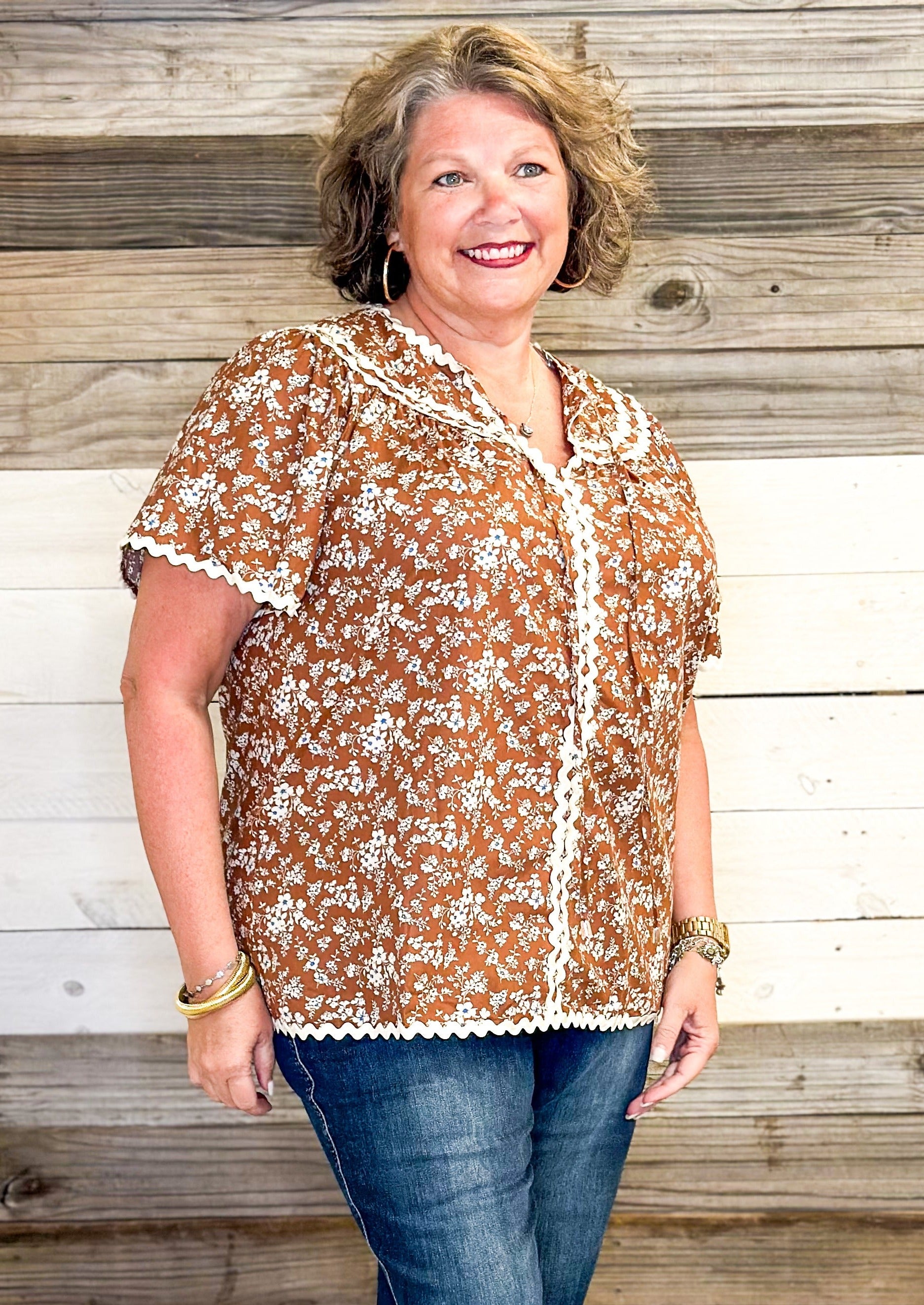 brown floral with hints of blue top - rick rack edging detail - small v-neck top with tie neck