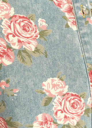 close up of floral denim dress detail