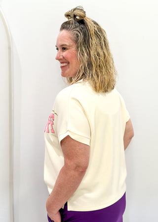 cream short sleeve crop tee with "CLASSY UNTIL KICKOFF" in chenille and sequin detail. 