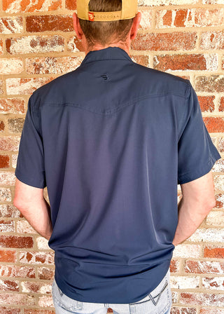 Navy blue button up polo shirt with short sleeves.