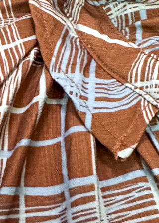 close up of brown and blue plaid fabric