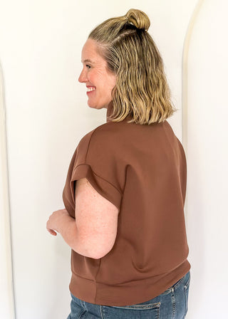 Brown 1/4 zip butter soft top with short sleeves.