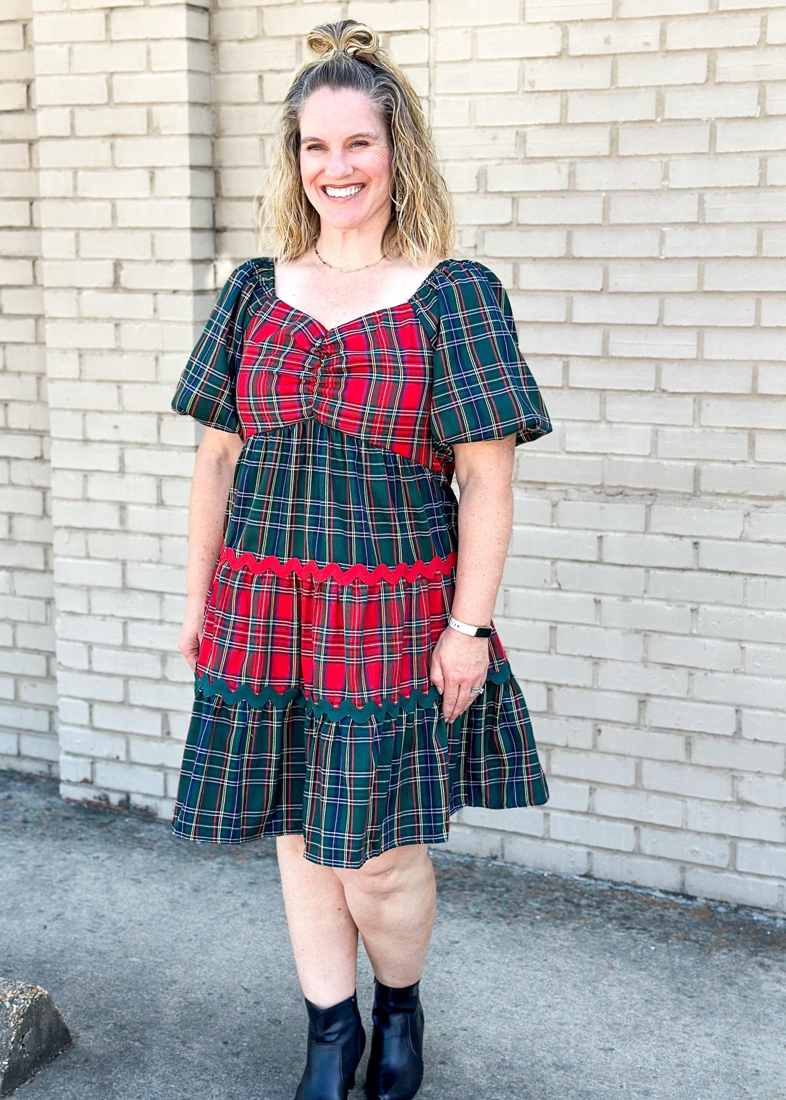 red and green tiered plaid dress - sleeves are green and alternating tiers of red and green plaid with red or green rick rack in between tiers