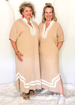 light brown short sleeve maxi dress with white contrast collar and detail with pockets. 