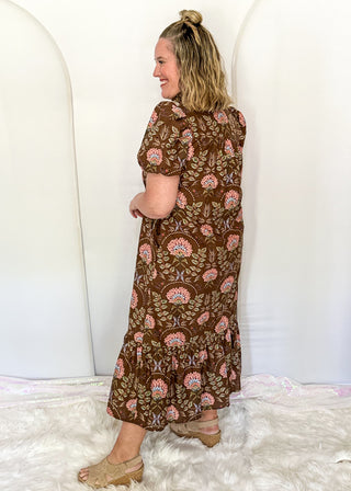 women wearing brown midi dress with floral pattern
