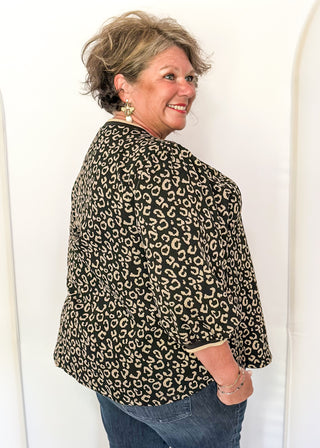 Animal print puff sleeve top with striped collar and cuffs