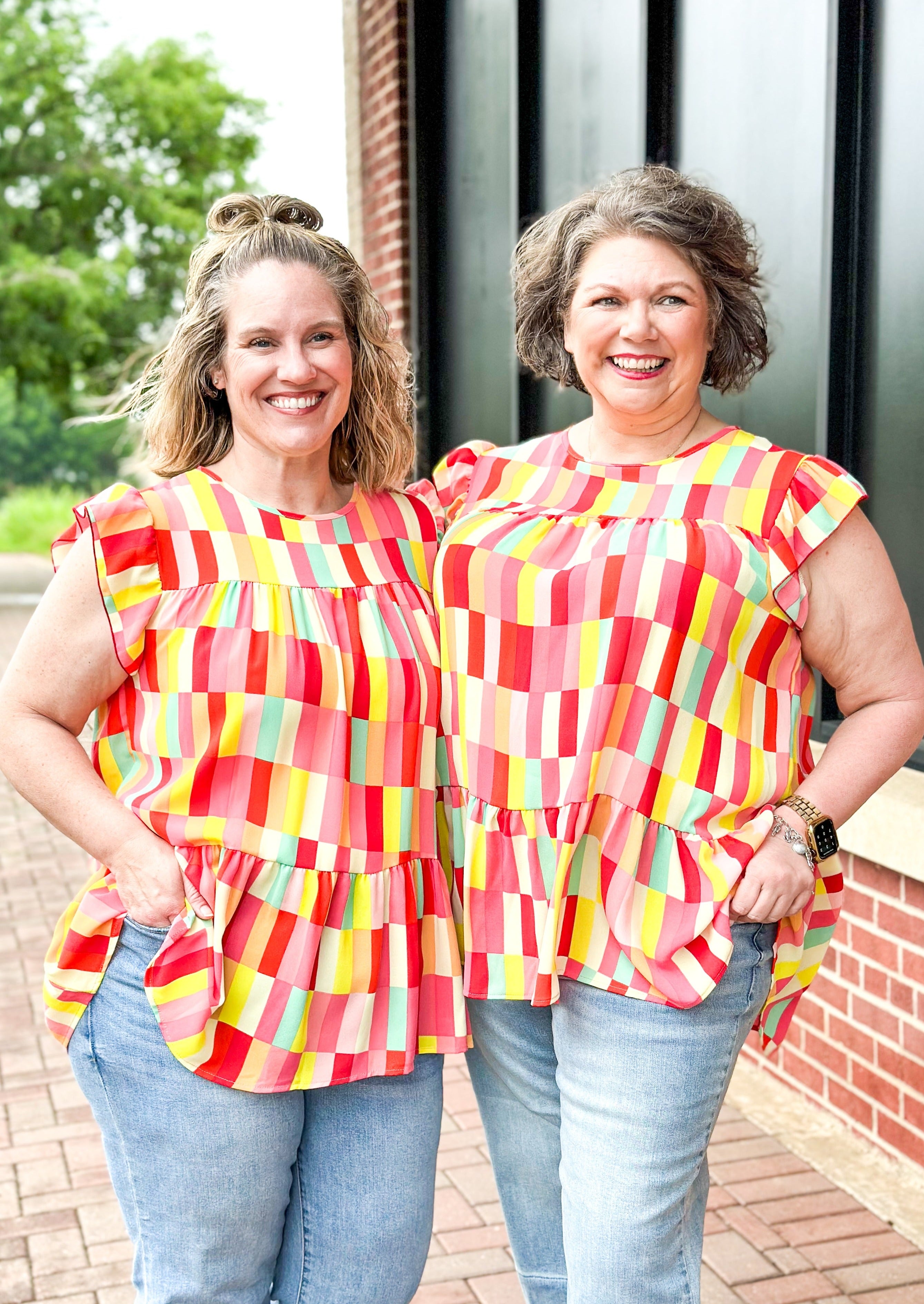 Ruffle Frill Short Sleeve Geometric print top - reds, whites, pinks, yellows, orange and some mint green - round neck - low ruffle - great length