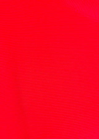 Close up of ribbed outfit in Red featuring boxy top and wide leg pants