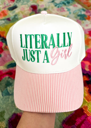 Women's snapback hat embroidered with "Literally Just A Girl" in Green and Pink with pink and white stripe bill. 