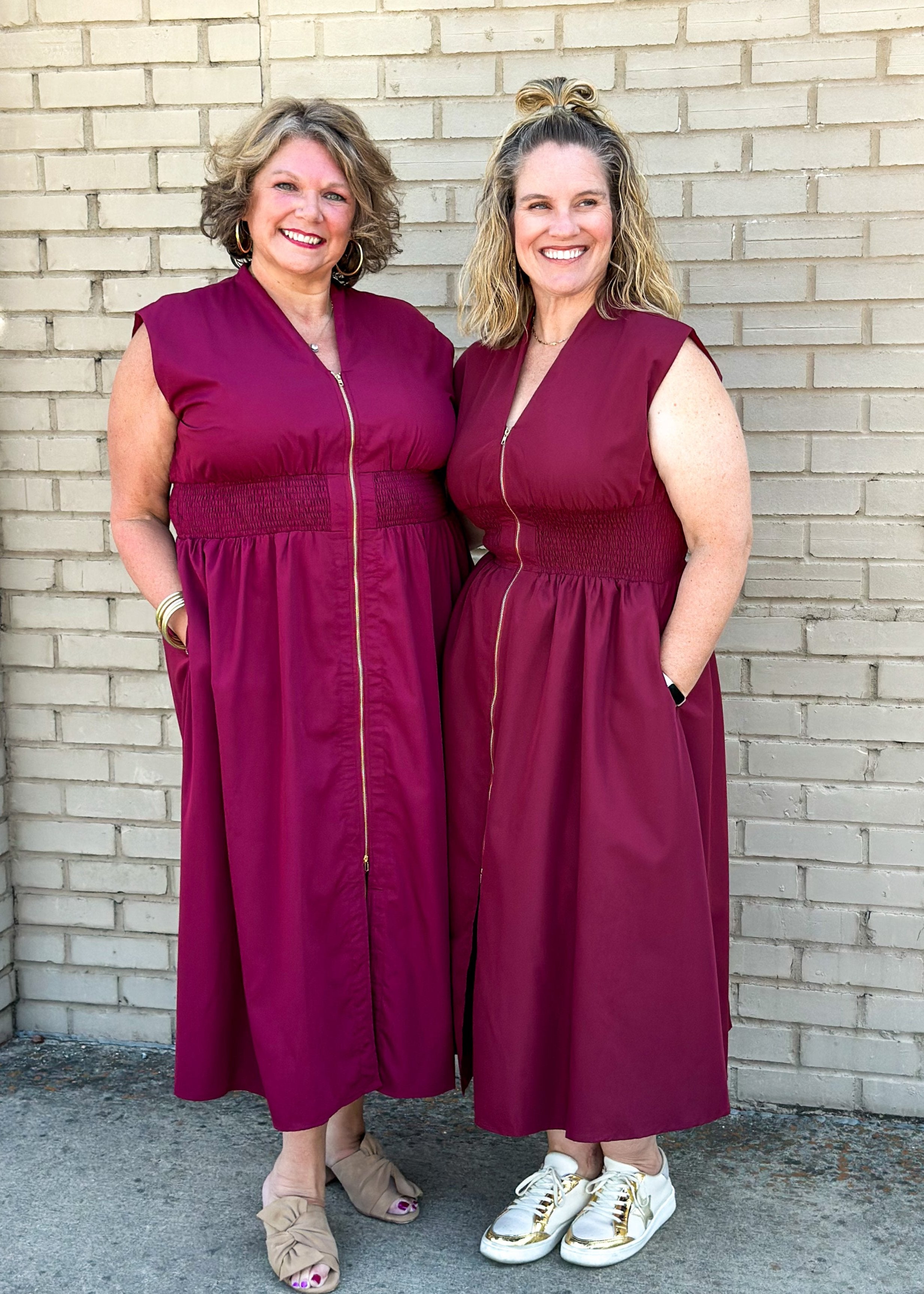 entro brand merlot colored midi dress with gold zipper down the front, smocked waistband, lined and pockets