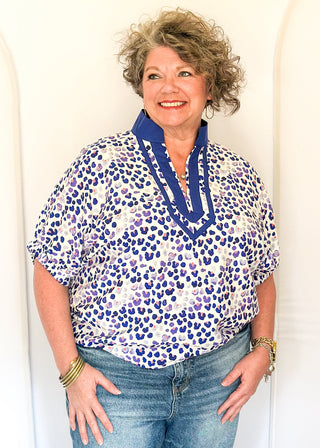 Patterned leopard top with easy silhouette and statement neckline