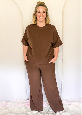 Two piece ribbed outfit in brown featuring boxy top and wide leg pants