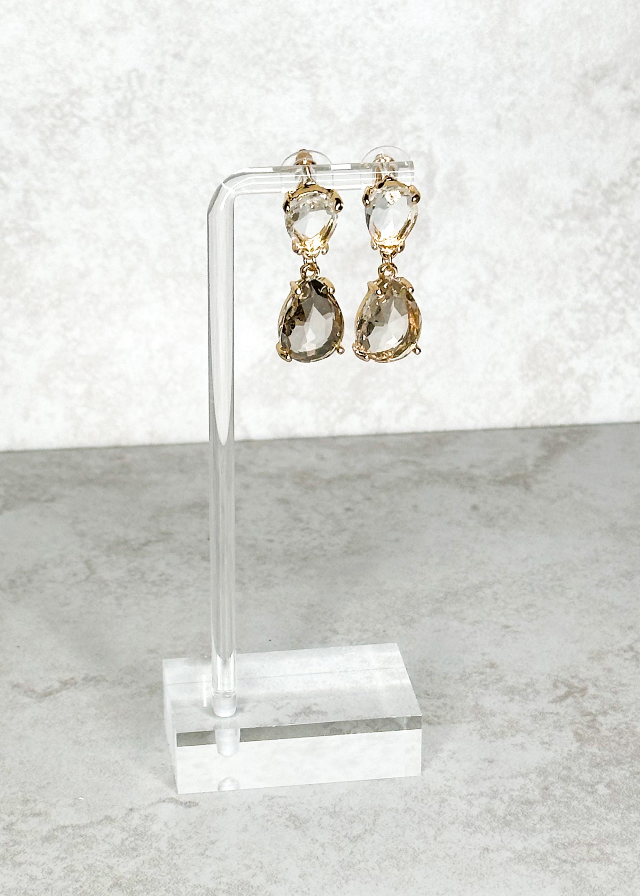 Two tier clear and gray with gold hardware post back earrings.