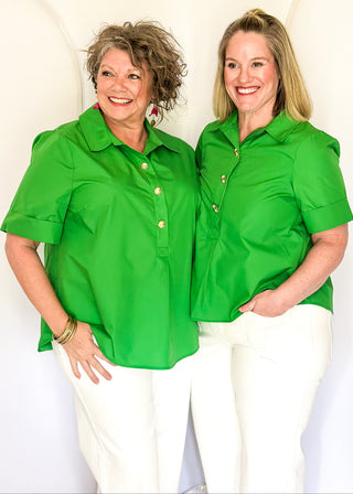 Collared green blouse with detailed gold snaps. short sleeve