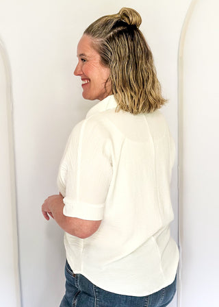 White collared top with v-neckline 