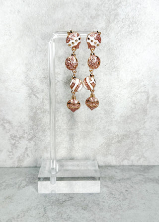 Set of dangle earrings with 4 ornaments in pink and gold 