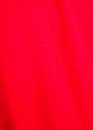 close up of women's ruffle collar blouse with 3/4 sleeve- in red.