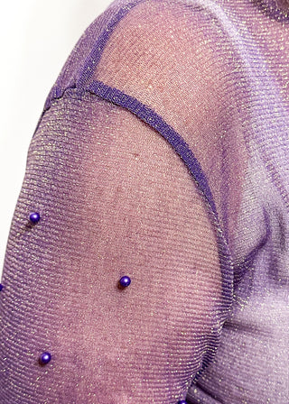 Long sleeve mock neck top with pearl accented sleeves in purple with gold metallic threads.
