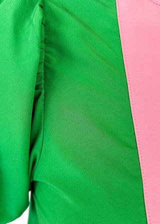 green puff short sleeve top with pink around v-neck and collar and arm banding