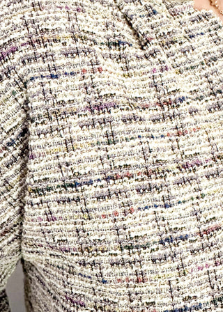 tweed hooded long sleeve top with pockets.  Colors of purple, cream, gray