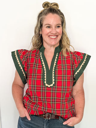 Red plaid flutter sleeve top- with dark green contrast and off white scallop detail.