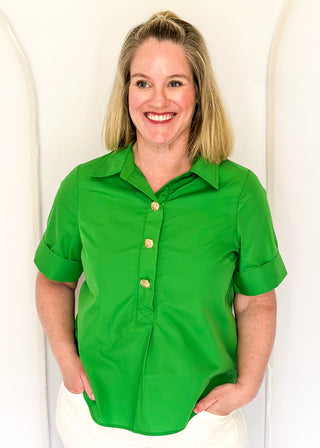 Collared green blouse with detailed gold snaps. short sleeve