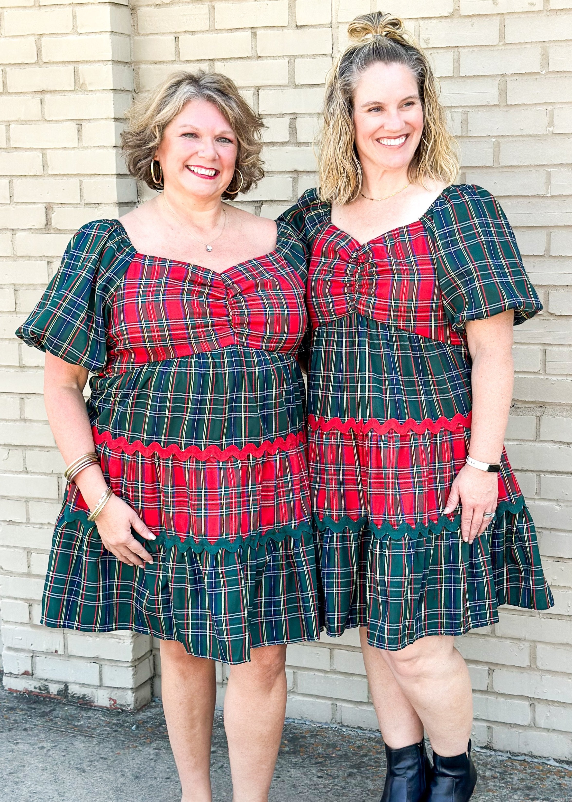 red and green tiered plaid dress - sleeves are green and alternating tiers of red and green plaid with red or green rick rack in between tiers