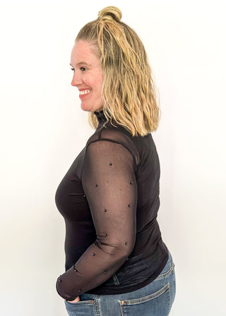 Mock neck mesh black top with black beaded sleeves.
