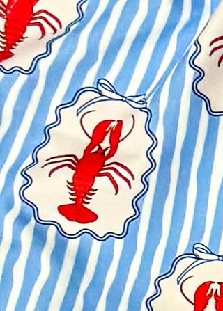 Close up of blue and white stripe shorts with lobster