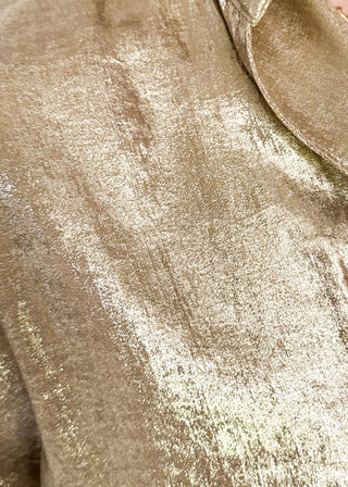 close up of shimmer Gold V-neck blouse