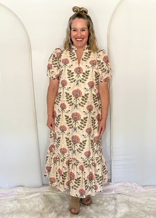 women wearing ecru midi dress with floral pattern