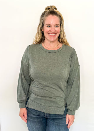 round neck oversized loose fit long sleeve with band cut edge detail with slits. 