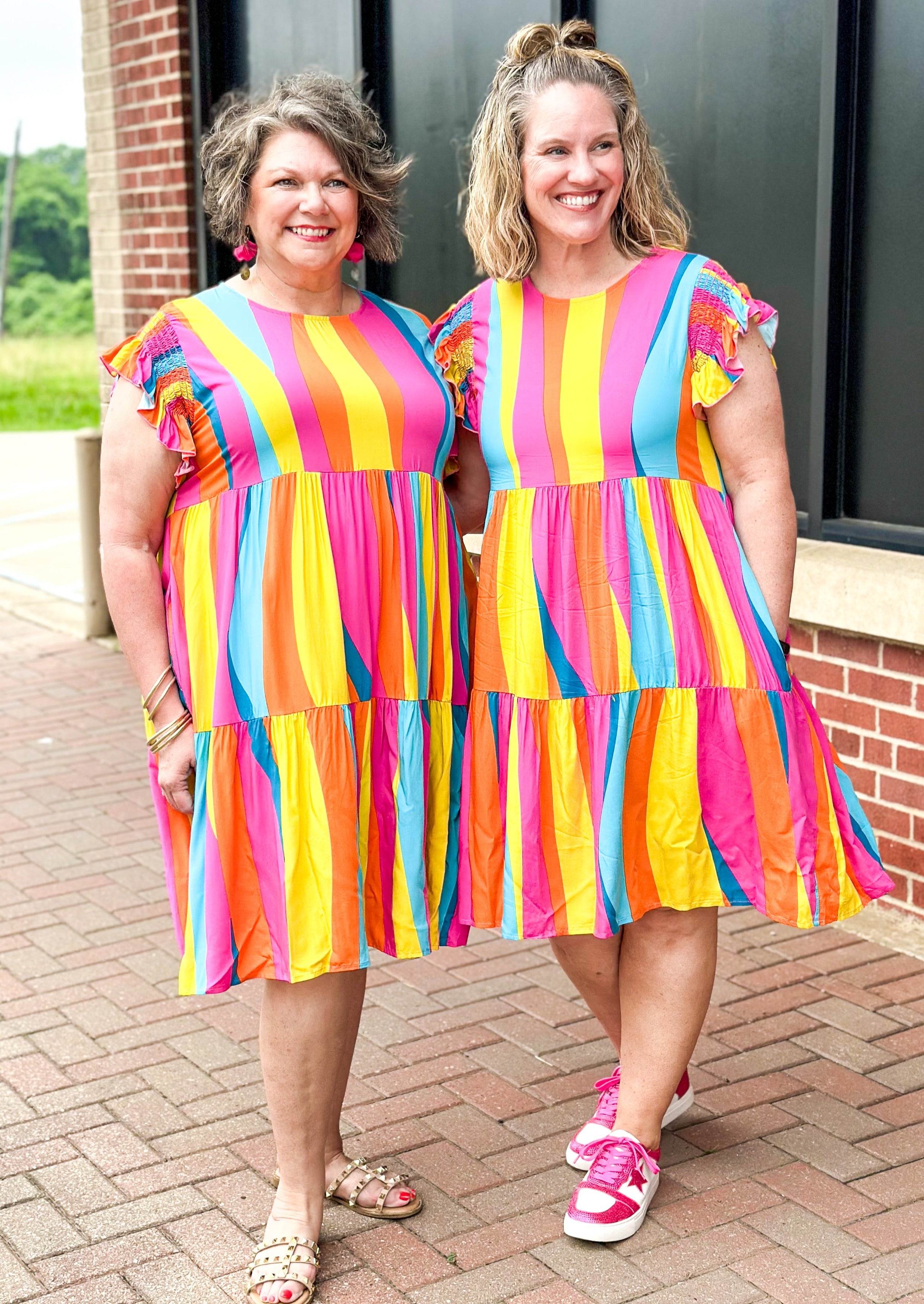 Vertical stripe tiered dress with smocked ruffle short sleeve - pockets - stripes are yellow, pink, orange and 2 shades of blue