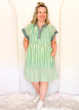 Green striped short sleeve dress with denim contrast on collar and sleeves. 