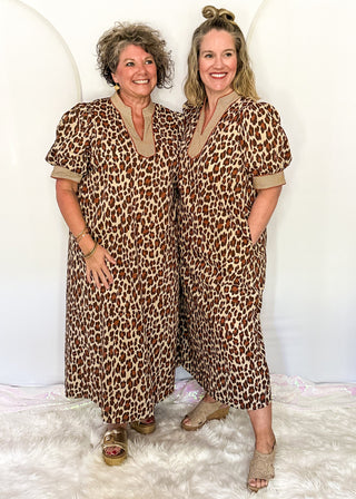 two women standing in leopard print Maxi Dress