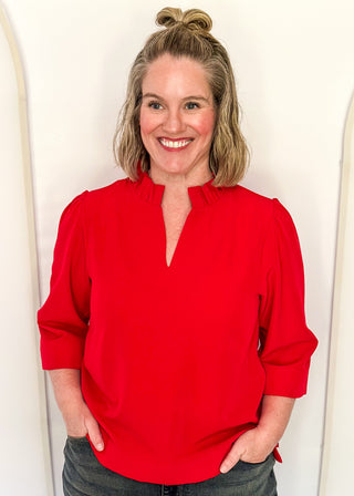 Women's ruffle collar blouse with 3/4 sleeve- in red.
