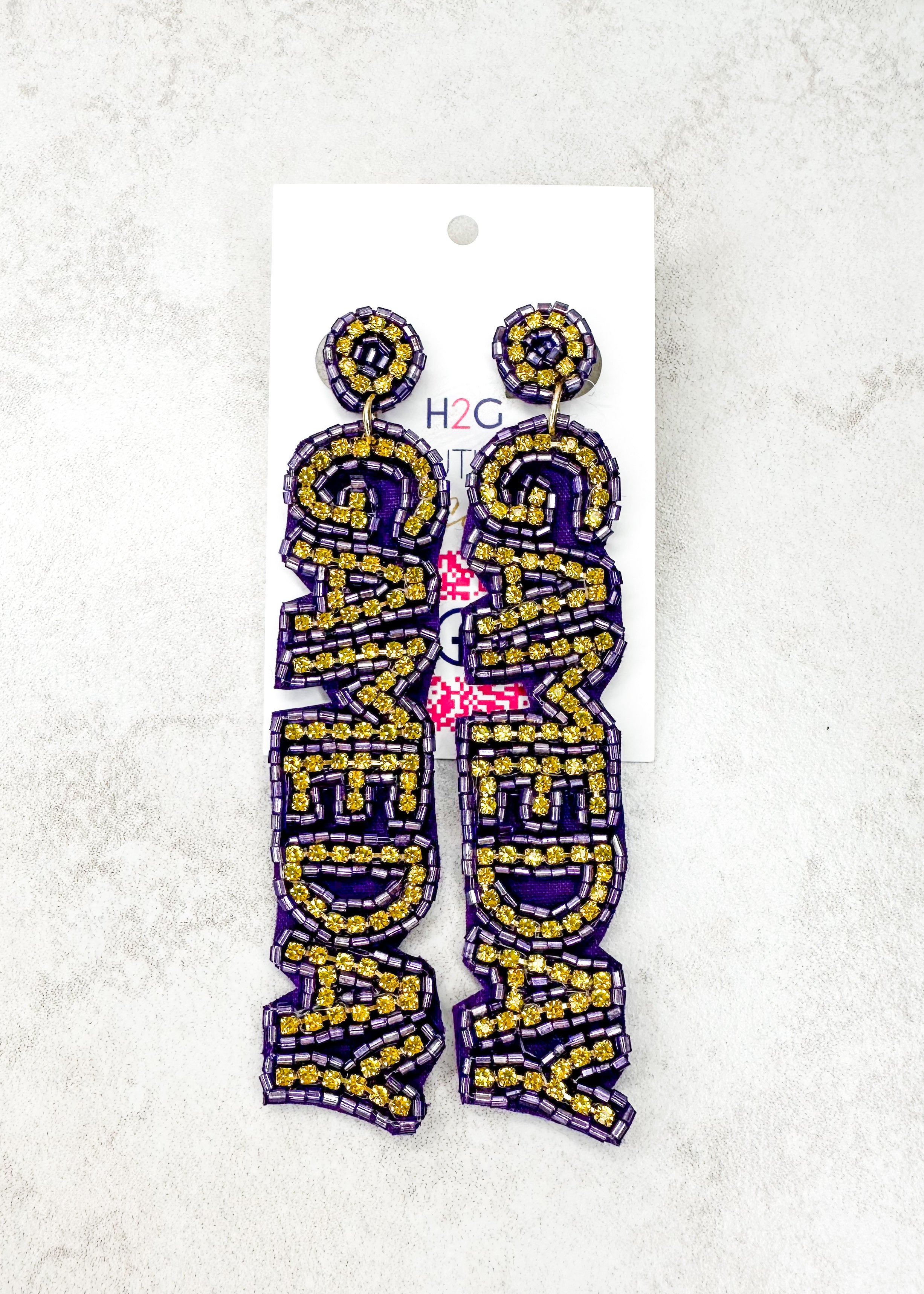 seed bead post back earrings that spell out game day - gold spelling with purple background