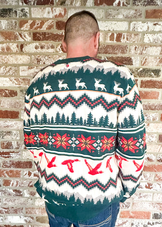 Men's Christmas sweater with woodsy theme.