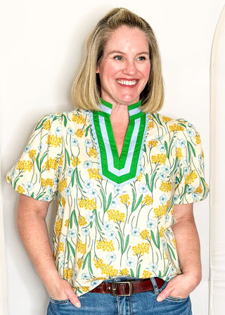 Spring floral top with short sleeves, easy silhouette, and colorful yellow, blue and green.