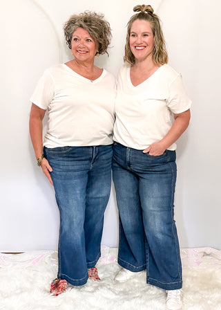 Judy Blue high-waisted ankle jeans in a classic dark wash denim.