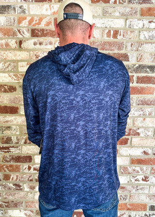 Back of man modeling performance hoodie 