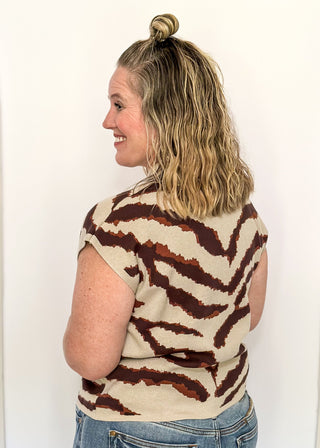 tiger striped short sleeve sweater with oatmeal background